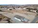 Spacious new home set on a large lot with desert landscaping and an attached two car garage at 2560 Tahachapi Ave, Pahrump, NV 89048