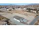 An aerial view shows the back of the new house on a large vacant lot in a quiet neighborhood at 2560 Tahachapi Ave, Pahrump, NV 89048