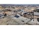 An aerial view shows the house and lot surrounded by a neighborhood with mature trees at 2560 Tahachapi Ave, Pahrump, NV 89048