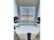 Bathroom featuring a stand alone tub and a view at 2560 Tahachapi Ave, Pahrump, NV 89048