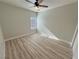 Comfortable bedroom featuring a ceiling fan and plank flooring at 2560 Tahachapi Ave, Pahrump, NV 89048