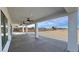 Extended covered patio with ceiling fans, overlooking a desert landscape at 2560 Tahachapi Ave, Pahrump, NV 89048