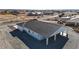 A bird's-eye view reveals the home's roof, carport, and exterior details of its architecture at 2560 Tahachapi Ave, Pahrump, NV 89048
