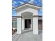 Elegant entryway with double doors and arched alcove at 2560 Tahachapi Ave, Pahrump, NV 89048