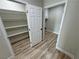 Walk-in pantry with ample shelving for storage at 2560 Tahachapi Ave, Pahrump, NV 89048