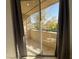 Private balcony with sliding glass doors and treetop views at 260 E Flamingo Rd # 433, Las Vegas, NV 89169