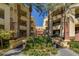 Well-maintained building exterior with attractive landscaping and walkways at 260 E Flamingo Rd # 433, Las Vegas, NV 89169