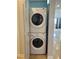 Laundry room with stacked washer and dryer and an entryway at 260 E Flamingo Rd # 433, Las Vegas, NV 89169