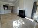 Living area with fireplace and tile floors at 260 E Flamingo Rd # 433, Las Vegas, NV 89169