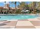 Relaxing swimming pool with lounge seating and well maintained landscaping at 260 E Flamingo Rd # 433, Las Vegas, NV 89169