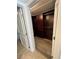 Large walk-in closet with wood shelving and hanging rods at 260 E Flamingo Rd # 433, Las Vegas, NV 89169