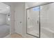 Modern shower with glass enclosure and window at 2720 High Echelon Rd, North Las Vegas, NV 89086