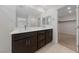 Double vanity bathroom with a large closet at 2720 High Echelon Rd, North Las Vegas, NV 89086