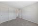 Bedroom with double door closet and access to hallway at 2720 High Echelon Rd, North Las Vegas, NV 89086