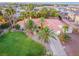 Aerial view of home with lush lawn and palm trees at 274 Doobie Ave, Las Vegas, NV 89183