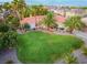 Aerial view showing single-story home with a spacious, landscaped front yard at 274 Doobie Ave, Las Vegas, NV 89183