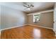 Bright bedroom with wood floors, ceiling fan, and window seat at 274 Doobie Ave, Las Vegas, NV 89183