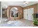 Bright entryway with double doors and tiled floor at 274 Doobie Ave, Las Vegas, NV 89183