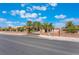 House exterior with gated entry and palm trees at 274 Doobie Ave, Las Vegas, NV 89183