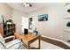 Home office with wooden desk and neutral decor at 274 Doobie Ave, Las Vegas, NV 89183