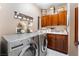 Bright laundry room, featuring washer, dryer, and ample cabinetry at 274 Doobie Ave, Las Vegas, NV 89183