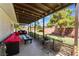 Relaxing covered patio with seating area, perfect for outdoor entertaining at 274 Doobie Ave, Las Vegas, NV 89183