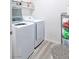 Convenient laundry room with washer, dryer, and storage at 2844 Copper Wind Ln # 4, Las Vegas, NV 89183