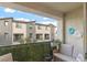 Private patio with seating area and view of community at 2844 Copper Wind Ln # 4, Las Vegas, NV 89183