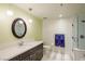 Bathroom with a walk-in shower and modern vanity at 29 Montelago Blvd # 317, Henderson, NV 89011