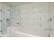 Clean bathroom with a bathtub and glass shower at 29 Montelago Blvd # 317, Henderson, NV 89011