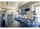 Fitness center with various exercise equipment and TVs at 29 Montelago Blvd # 317, Henderson, NV 89011