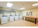 Convenient on-site laundry facility with multiple washers and dryers at 29 Montelago Blvd # 317, Henderson, NV 89011