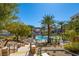 Resort-style pool with palm trees and views of the surrounding area at 29 Montelago Blvd # 317, Henderson, NV 89011