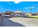 House exterior with carport, yard, and driveway at 3169 Nottingham Dr, Las Vegas, NV 89121