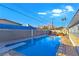 Inviting backyard pool with diving board, ready for summer fun! at 3169 Nottingham Dr, Las Vegas, NV 89121