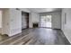 Living room featuring a fireplace, sliding glass door, and wood-look floors at 3318 N Decatur Blvd # 2138, Las Vegas, NV 89130