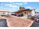 Brick paved backyard with covered patio area at 35 Jade Cir, Las Vegas, NV 89106