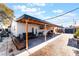 Large covered patio, brick pavers and seating area at 35 Jade Cir, Las Vegas, NV 89106