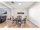 Dining area with four chairs and tile floor at 35 Jade Cir, Las Vegas, NV 89106