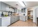 Gray cabinets, tile floors, and a spacious pantry at 35 Jade Cir, Las Vegas, NV 89106