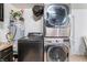 Stackable LG washer and dryer in a spacious laundry room at 35 Jade Cir, Las Vegas, NV 89106