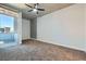 Bright bedroom with carpet flooring and access to a private balcony at 353 E Bonneville Ave # 804, Las Vegas, NV 89101