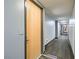 Modern hallway with carpeted floors and neutral walls at 353 E Bonneville Ave # 804, Las Vegas, NV 89101