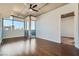 Bright living room with hardwood floors and access to balcony at 353 E Bonneville Ave # 804, Las Vegas, NV 89101