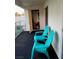 Private balcony with storage and two teal chairs at 3550 Bay Sands Dr # 2062, Laughlin, NV 89029