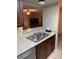 Well-equipped kitchen with double sink and wood cabinets at 3550 Bay Sands Dr # 2062, Laughlin, NV 89029