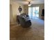 Relaxing living room with comfy seating and sliding door access at 3550 Bay Sands Dr # 2062, Laughlin, NV 89029