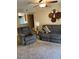 Relaxing living room with reclining sofas and ceiling fan at 3550 Bay Sands Dr # 2062, Laughlin, NV 89029