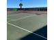 Outdoor tennis court with green surface and well-maintained net, ready for a match at 3550 Bay Sands Dr # 2062, Laughlin, NV 89029