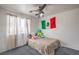 Bright bedroom with double bed, window coverings, and ceiling fan at 3592 Gloucester Gate St, Las Vegas, NV 89122